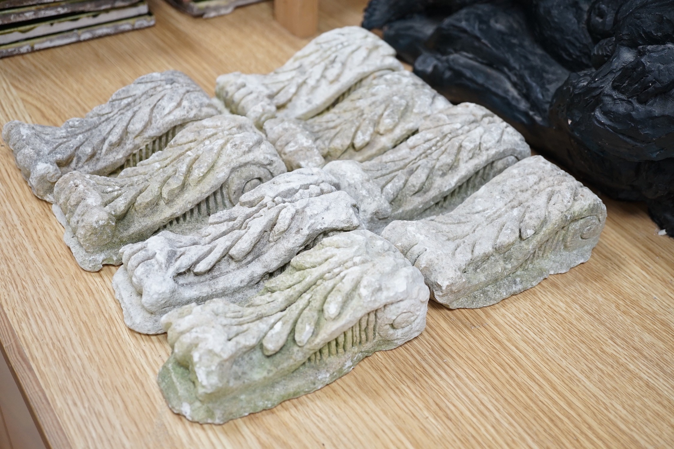 A plaster figural reclining nude signed ‘Roch’ and eight stone mounts